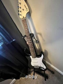 Squier by Fender Stratocaster Electric Guitar Black, Standard Series, with Case