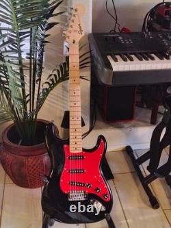 Squire Fender Stratocaster Black withSolid Red PickGuard, Upgraded electronics